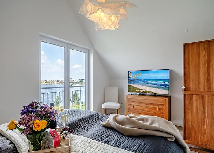 Casa de Férias An Der Ostsee By Seeblick Ferien Oro, Direkte Wasserlage,sauna, E-saeule